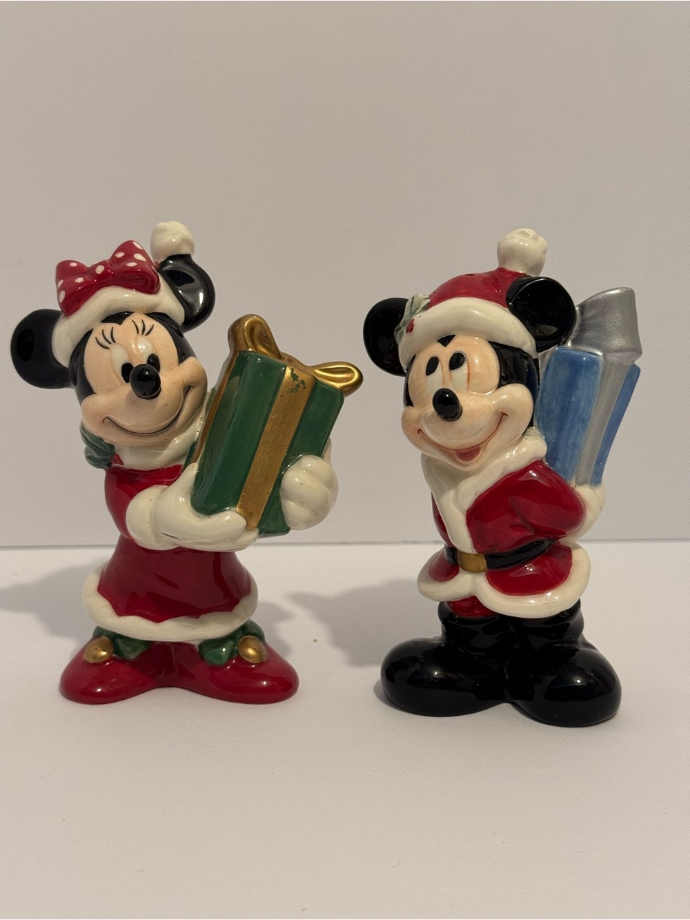 Disney Mickey and Minnie Mouse Christmas ceramic salt and pepper shaker set.